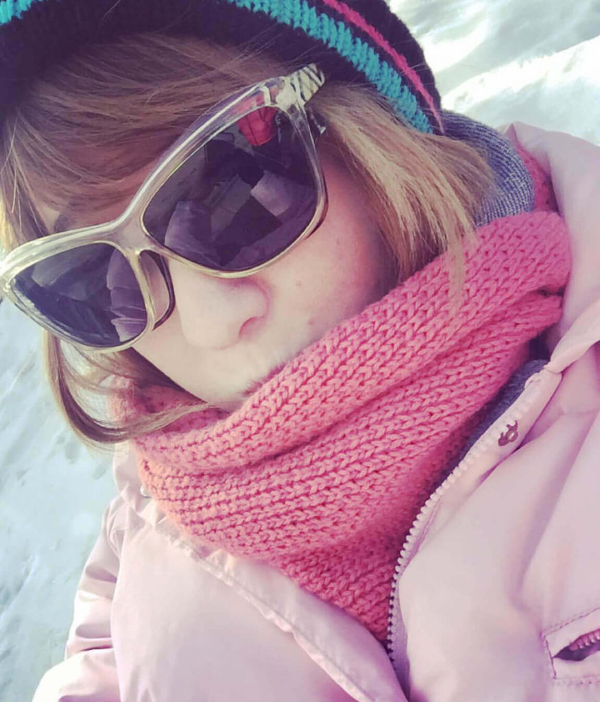 Breckenridge, Colorado Trip Closeup of women in sunglasses with a scarf around her face
