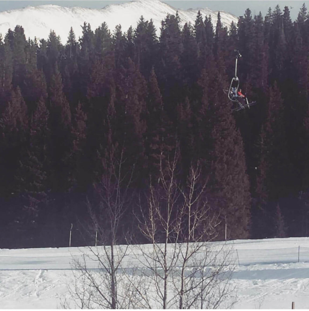 Breckenridge, Colorado Trip - Ski Lift Ski Lift with large trees in the background