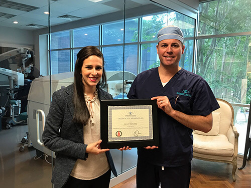 San Antonio Parkhurst NuVision Award Dr Parkhurst and Dr. Ashley Olivarez holding an Award