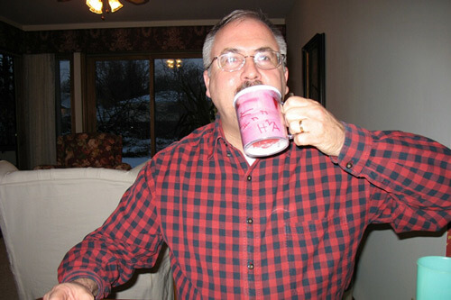 Dr. Parkhurst's Father dad in plaid shirt drinking from mug