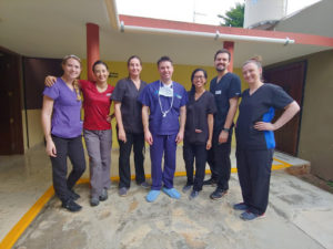 Dr. Parkhurst standing around team