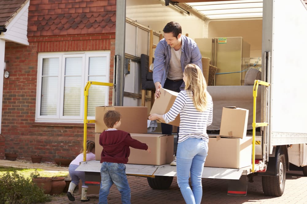 Family loading up a moving truck